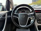 Opel Astra 2012 — фото 14